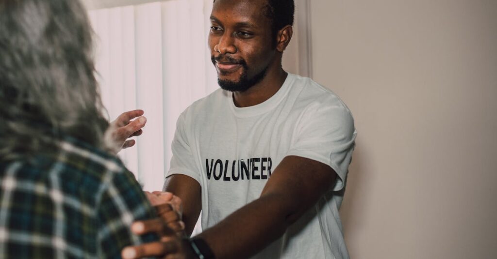 pexels-photo-6647061-6647061-1 A compassionate volunteer helping a senior adult in a home setting.